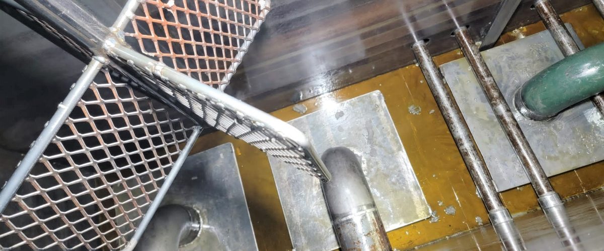 Coolant Tank Cleaning Process – Coopermatics Case Study: How We Performed a Complete Clean-up of an 18,000 Gallon Coolant Tank