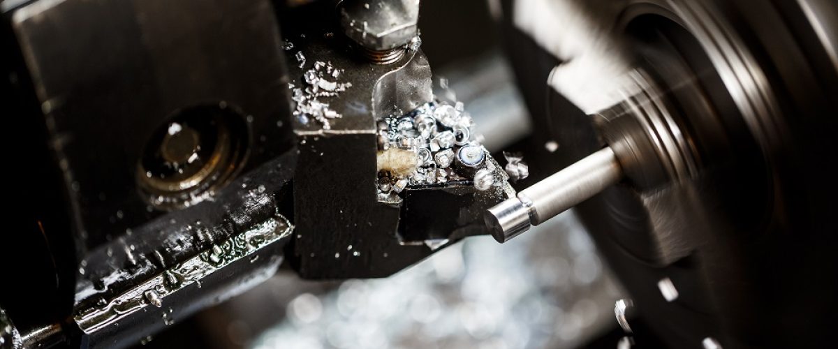 Close up of metalworking machine Close up photo of metalworking machine on plant.